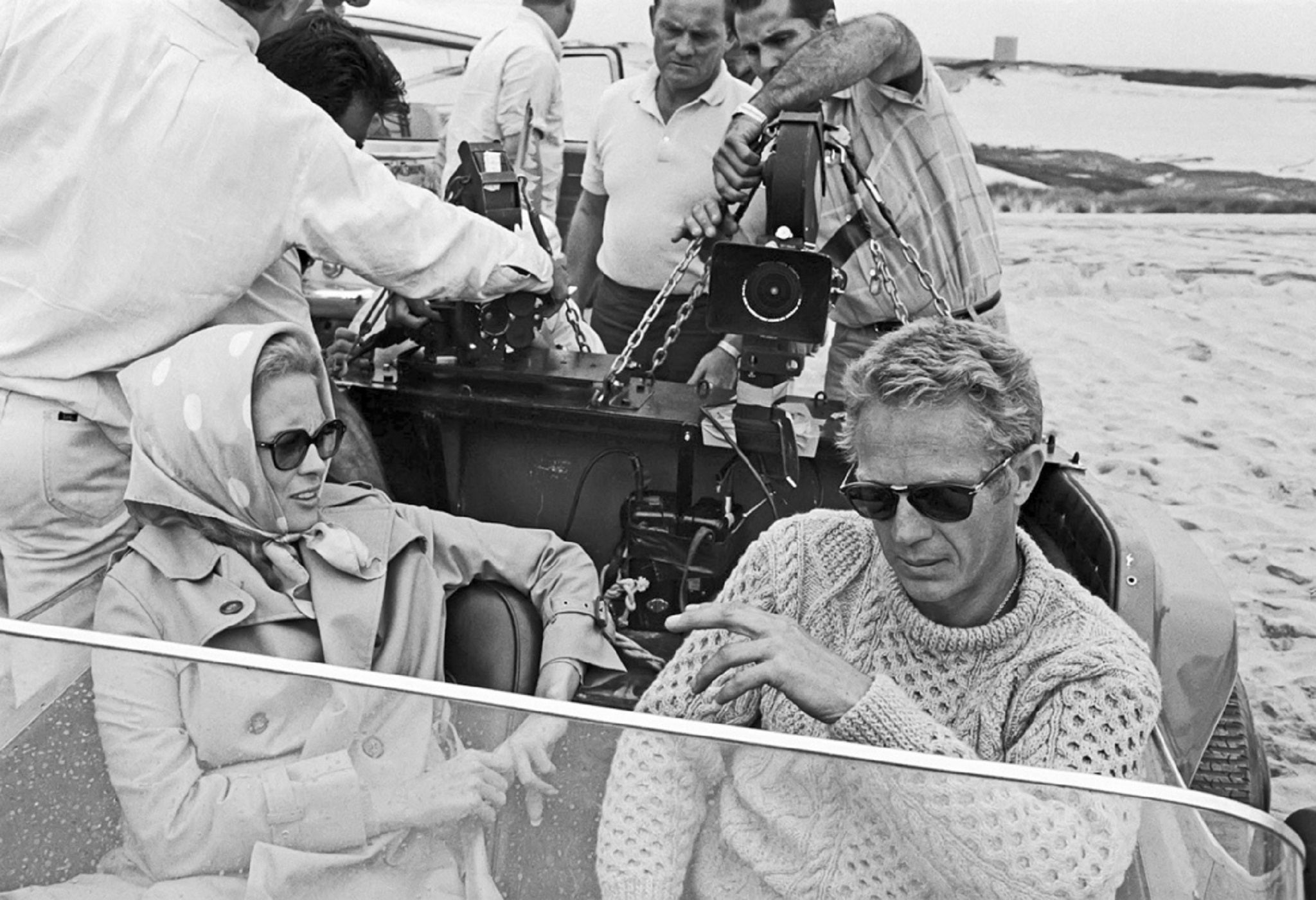 Style icon Steve McQueen shows how to wear a simple and casual cable knit sweater.