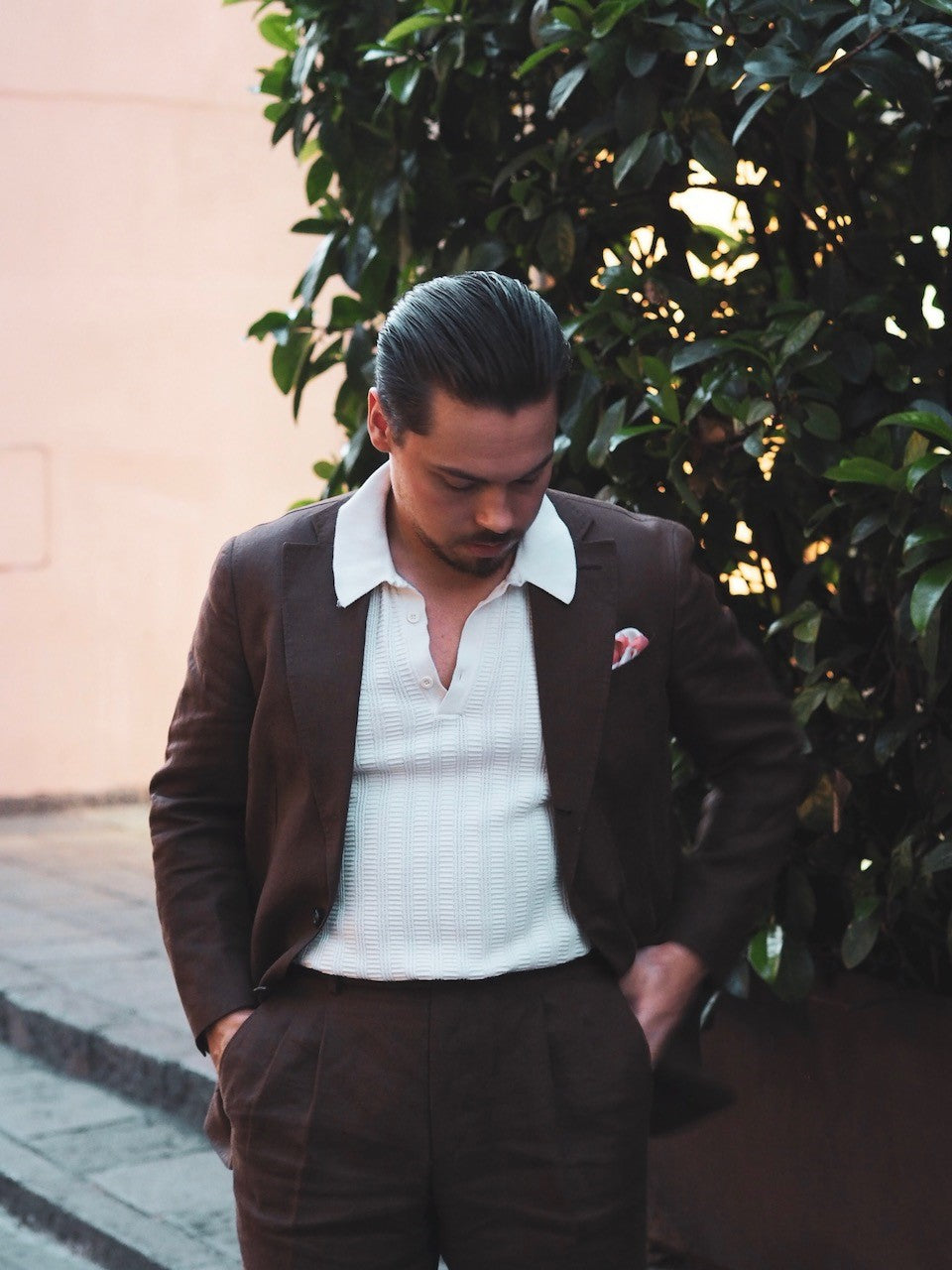 White knitted polo shirt with brown linen suit