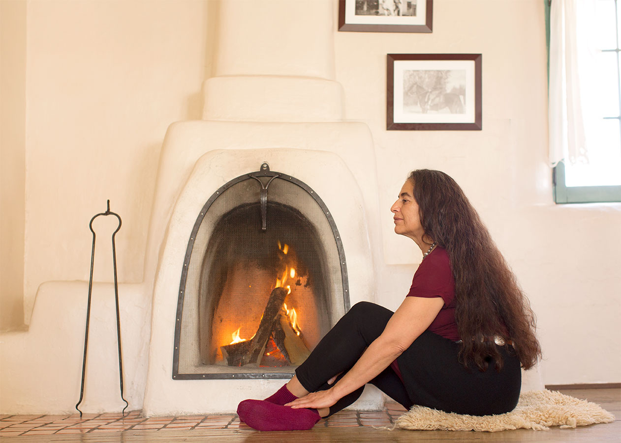 Taos artist and curator Maye Torres at the historic Mabel Dodge Luhan House with Golightly Cashmere