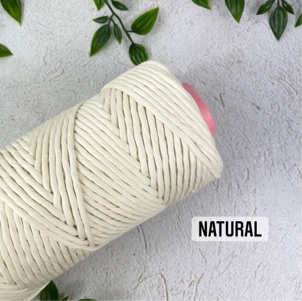 Premium Photo  Macrame leaf in natural color and thread windings