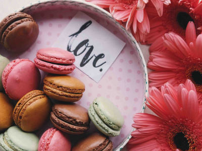 macarons and flowers with the note "love"