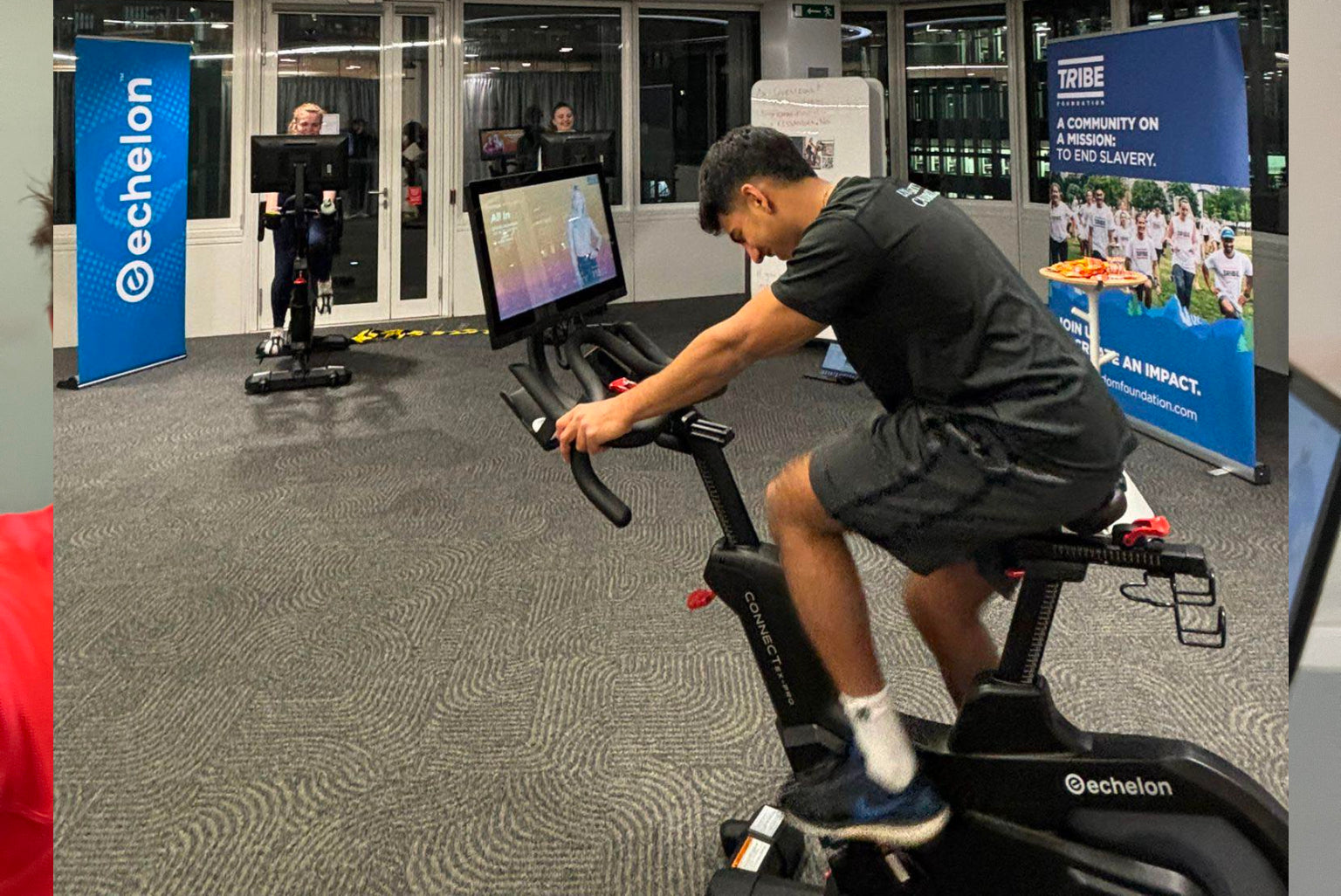 Accenture employees riding Echelon bikes