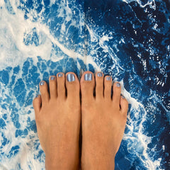 toes over ocean water