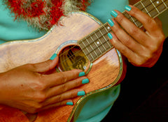 ukulele with painted hands