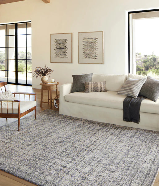 Area rugs in the Alie Collection have an elevated antique look and plush, modern feel. The rug’s underlying traditional motif is overlaid with a slightly higher pile that creates a softening effect like early morning fog. The Alie Collection for Amber Lewis × Loloi is power-loomed in Turkey with durability for high-traffic rooms in mind. These rugs also carry the Oeko-Tex® label, ensuring their materials don't contain harmful substances.