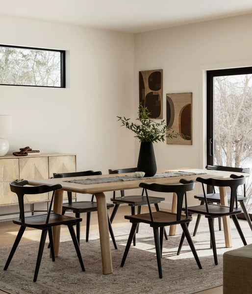 The Malibu dining table embodies an organic aesthetic throughout its design. Thick pieces of solid white oakwood are used from head to toe, showing off this piece's beautiful shades and grain pattern. The rounded edges on the legs and tabletop create a simple, contemporary, and natural flow. With seating space for 10, the Malibu dining table can host those larger dinner parties with ease.