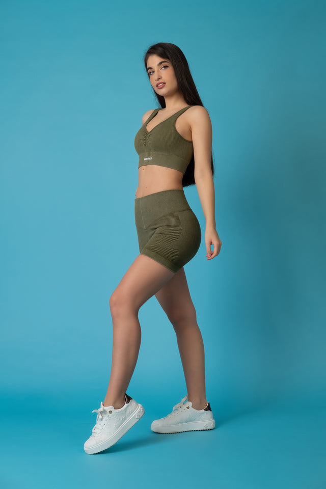 Bra Sport, Sport-Potential | Ribbed Top Green Olive-Abbigliamento per attività fisica-Siberica Swim-⚡️ Seamless Ribbed Fabric⚡️ Removable Pads⚡️ The model is 168 cm x 49 kg and is wearing a size M⚡️ Composition: 90% nylon, 10% spandex⚡️ Cropped Length⚡️ Secure Ribbed Underband⚡️Tight cut to the body Our Potential seamless crop top combines both personality with activewear. Featuring a bust flattering sweetheart neckline in our acid wash seamless fabric, this versatile crop top ensures you’re on 
