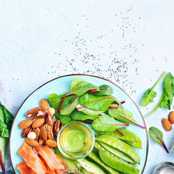 antioxidant rich dinner of salmon, nuts and greens