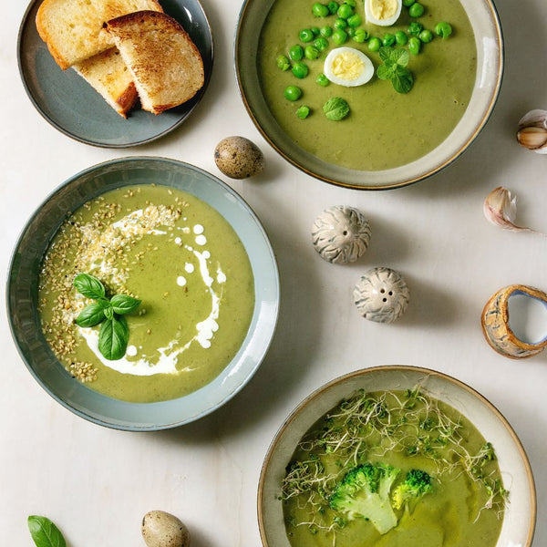 green soup with different toppings