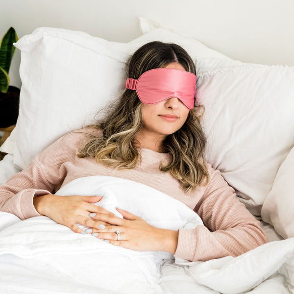 woman sleeping with eye mask