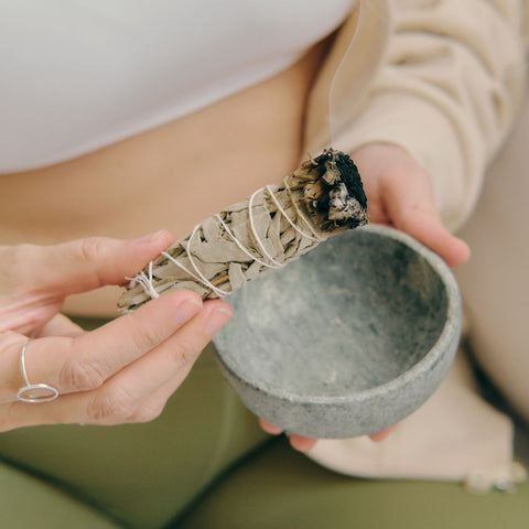 woman burning sage