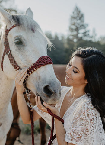 Woman and a white horse