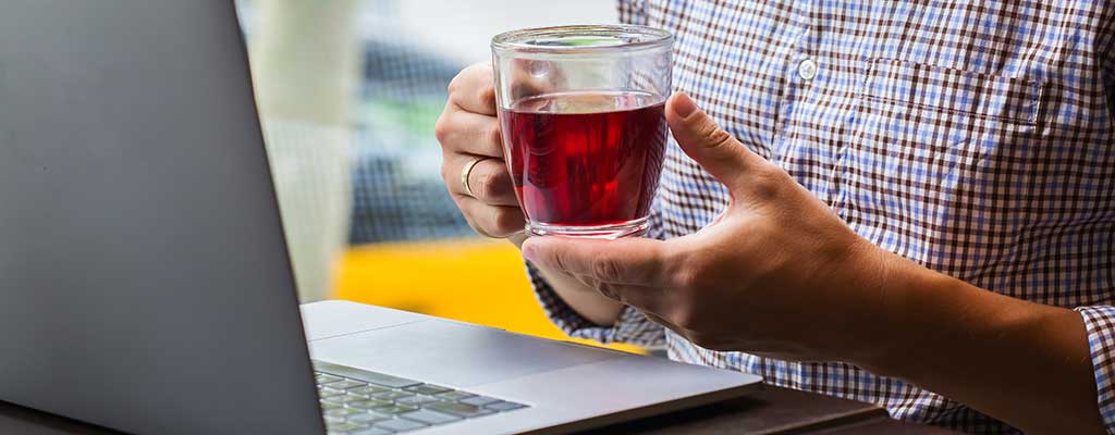 business man drinking tea at work