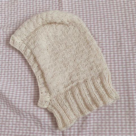 Flat lay of the cream colored Alchemilla Balaclava