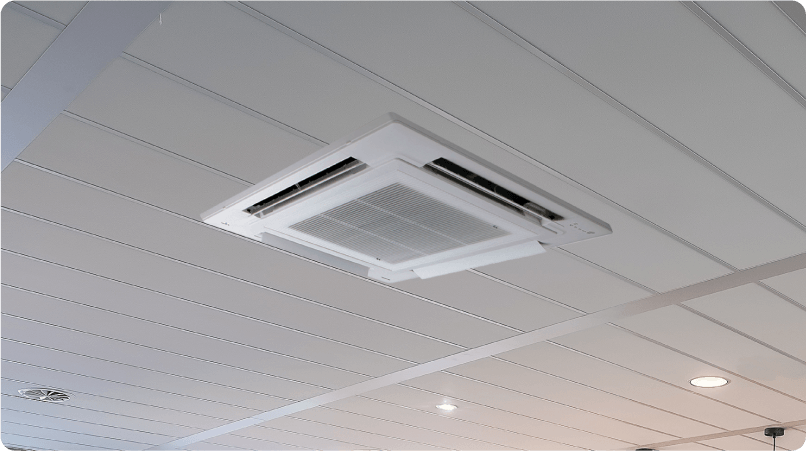 an image of a ceiling air conditioner unit on the ceiling