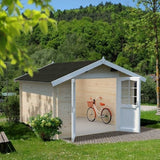 Large garden shed with French doors and a red bike inside