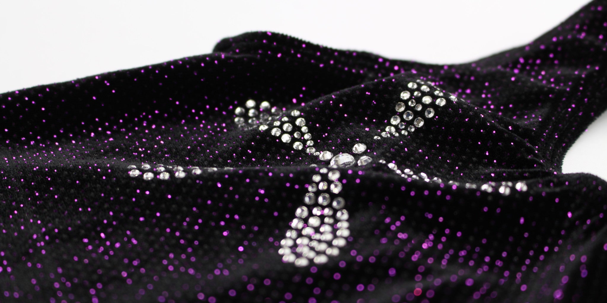 Gorgeous K-Lee Designs gymnastics leotard in black velvet with purple sparkles made and designed in Brisbane Australia