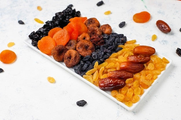 Various dried fruits, dates, plums, raisins and figs