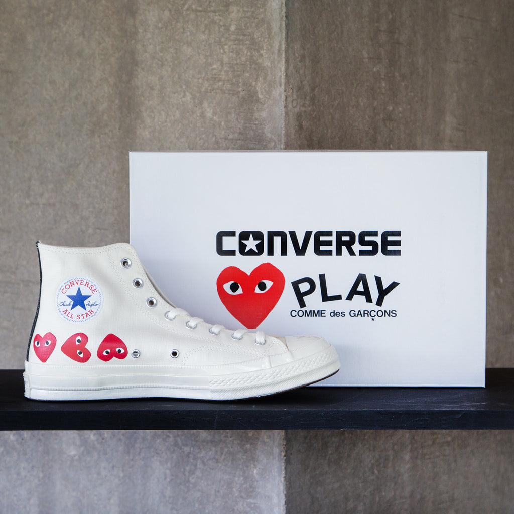 white high top converse with heart