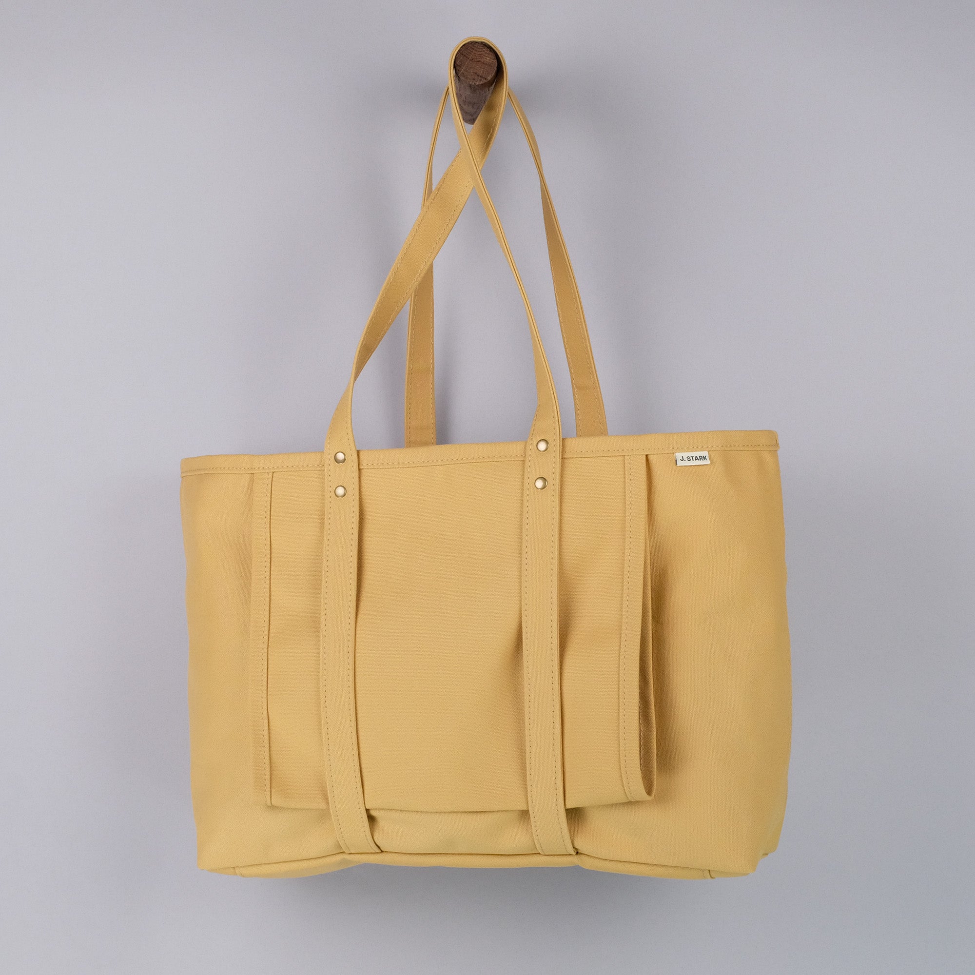 https://cdn.shopify.com/s/files/1/0048/9285/2291/files/j-stark-beachwood-yoga-tote-harvest-tan-side.jpg?v=1706200963&width=2000