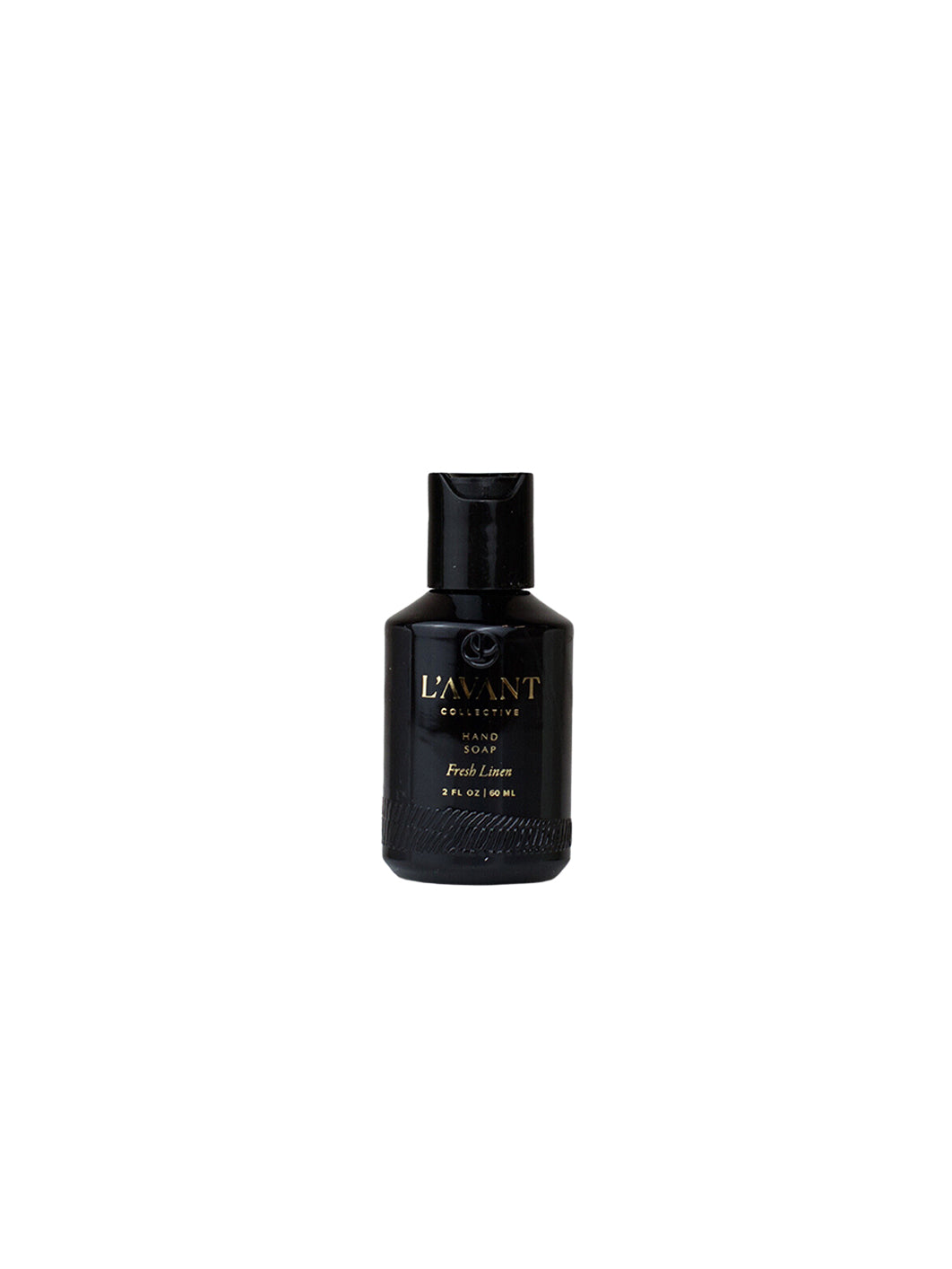 2 oz black bottle of travel hand soap with black cap. Gold embossed L'AVANT logo. 