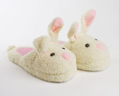 Pair of white bunny slippers with pink nose, ears, and long whiskers