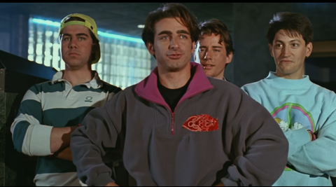 a group of young men all wearing sweatshirts