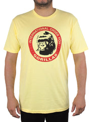 yellow t-shirt with a red circle on the front and a black picture of a gorilla face.  letters in the circle read "International Order for Gorillas"