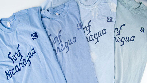 4 aged surf nicaragua tshirts displayed