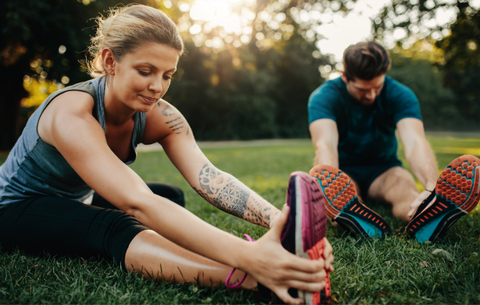 2 people stretching