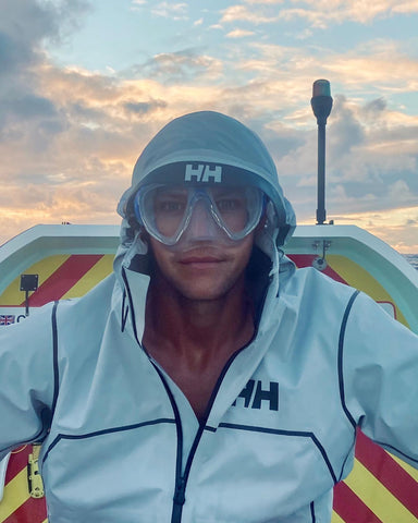 Adam wearing goggles and coat against the elements. Photo credit: Atlantic Campaigns