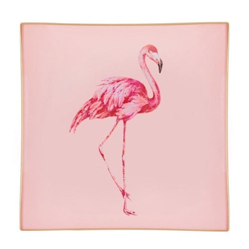 A decorative glass tray with a flamingo illustration on a blush pink background finished with an 18kt gold leaf edging