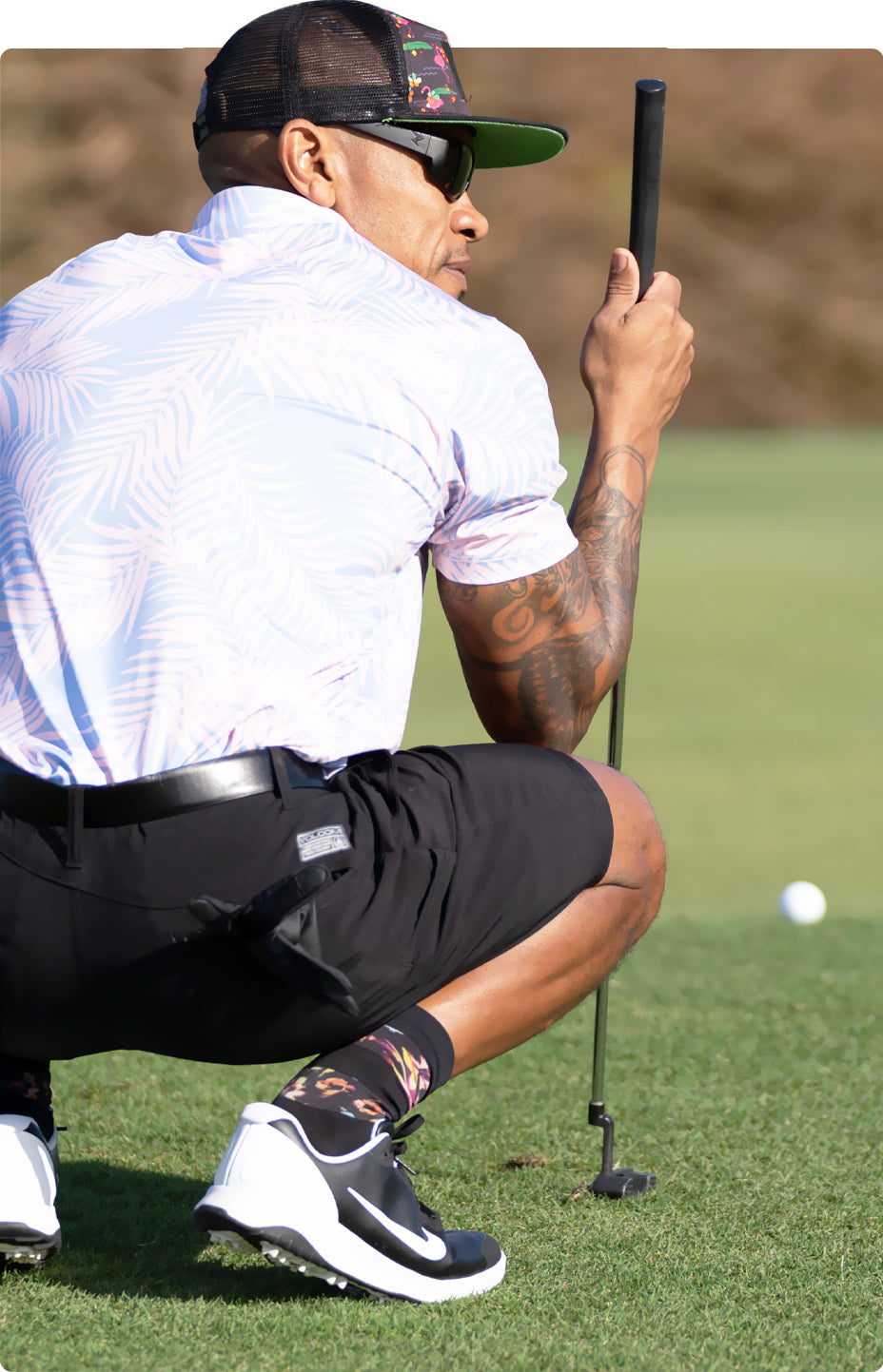 View of man on golf field without AMP's color enhancement