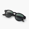 Swedish desginer sunglasses. Crystal clear with green lens. Made in Italy