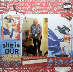 Wonder Woman themed scrapbook page featuring a senior woman