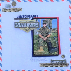 scrapbook page featuring photo of a young, smiling U.S. Marine. Page is decorated with military-themed embellishments