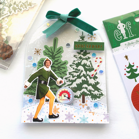 Handmade Christmas Card featuring Buddy the Elf against a snowy background with pinetrees