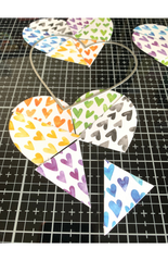 Large paper heart segments in six colors of Colorways scrapbook paper