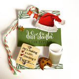 Christmas gift tag featuring 3D stickers of a Santa hat, cookies and milk, and Christmas list