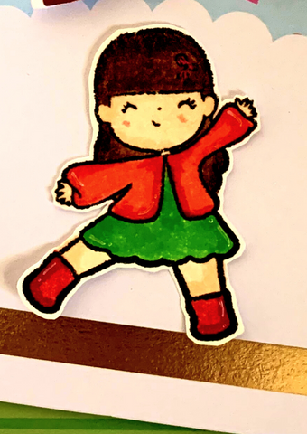 stamped image of happy little girl colored in to have brown hair, red sweater, and gree dress. 