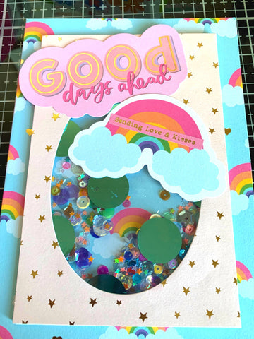 close up of Mommy Lhey shaker card featuring a large GOOD days ahead and large rainbow sticker