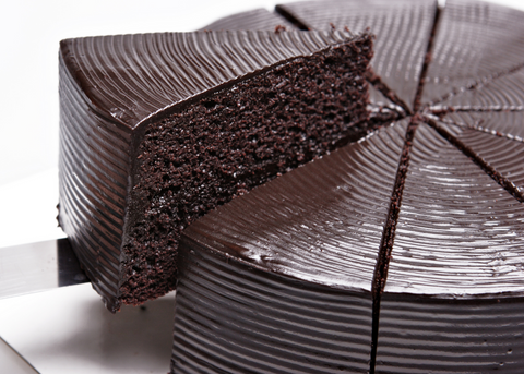 chocolate cake with slice being removed