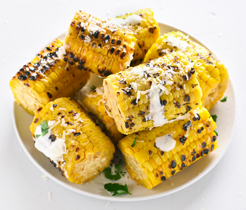 grilled corn on the cob with butter and cheese