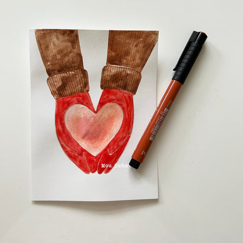 Painting of heart hands with a Pitt Artist Pen