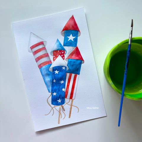 Watercolor firework drawing with a water cup and brush