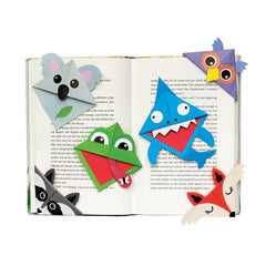Origami animals on a book