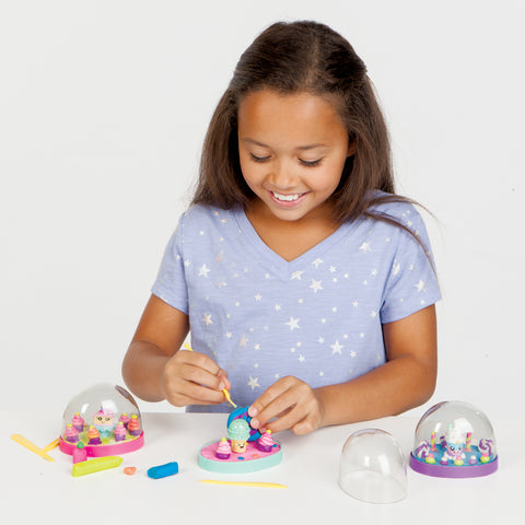 Girl making a Make Your Own Water Globe