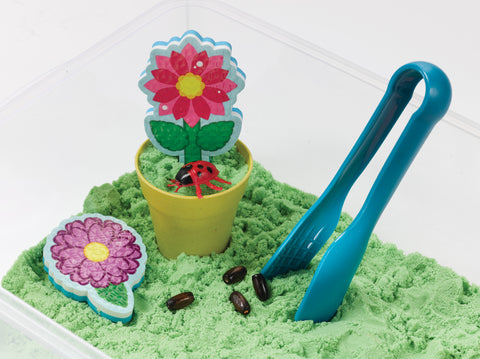 Sand and flowers in a Sensory Bin