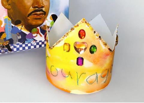 Watercolor paper crown and Martin Luther King Jr. Book