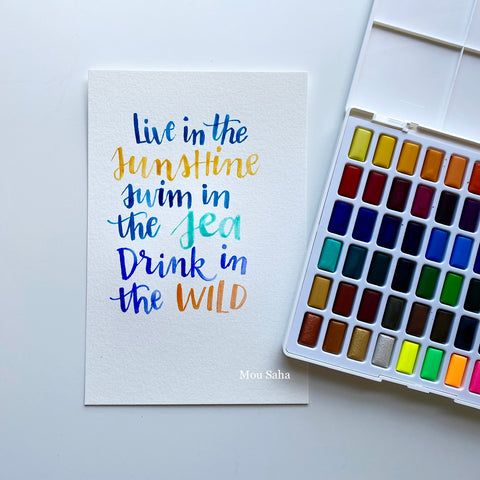 Watercolor lettering and a watercolor pan